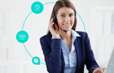 A smiling female support professional wearing a headset, working on a laptop with a circular graphic highlighting omni-channel Customer service solutions via phone and chat.